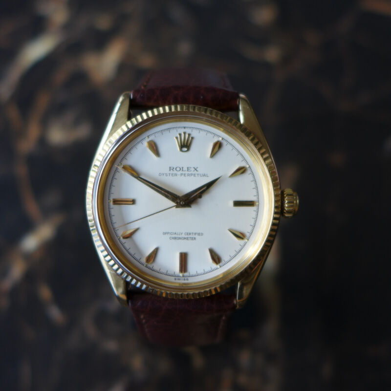 A STUNNING GENTS VINTAGE 1955 ROLEX OYSTER PERPETUAL WATCH IN 18K GOLD REF 6567