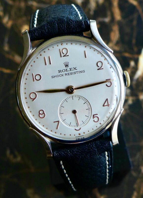 A BEAUTIFUL VINTAGE 1946 MID-SIZE ROLEX PRECISION WATCH WITH FANCY LUGS IN STEEL