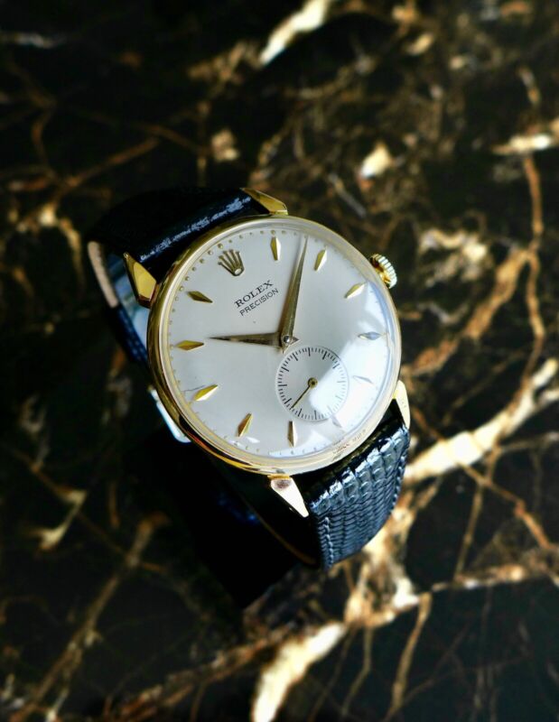 A BEAUTIFUL VINTAGE 1950s GENTS ROLEX PRECISION WITH FANCY LUGS IN 18K GOLD