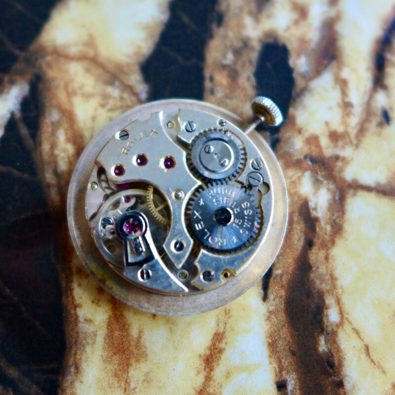 A BEAUTIFUL VINTAGE 1946 MID-SIZE ROLEX PRECISION WATCH WITH FANCY LUGS IN STEEL