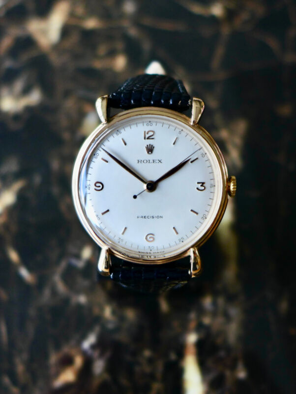 A BEAUTIFUL VINTAGE 1940s GENTS ROLEX PRECISION WITH TEARDROP LUGS 9K ROSE GOLD
