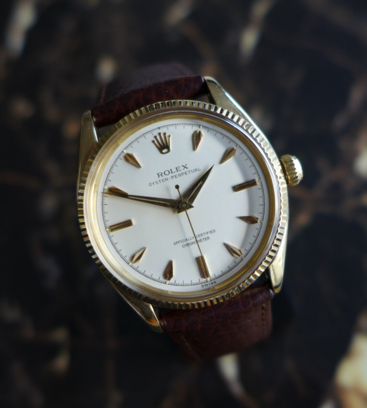 A STUNNING GENTS VINTAGE 1955 ROLEX OYSTER PERPETUAL WATCH IN 18K GOLD REF 6567