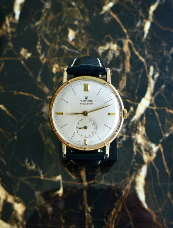 A BEAUTIFUL VINTAGE 1959 GENTS 35mm ROLEX METROPOLITAN CHRONOMETER IN 14K GOLD